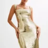 Adoria maxi-jurk met pailletten en uitsnijdingen – Goud Adoria maxi-jurk met pailletten en uitsnijdingen – Goud
