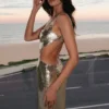 Adoria maxi-jurk met pailletten en uitsnijdingen – Goud Adoria maxi-jurk met pailletten en uitsnijdingen – Goud