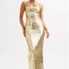 Adoria maxi-jurk met pailletten en uitsnijdingen – Goud Adoria maxi-jurk met pailletten en uitsnijdingen – Goud