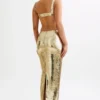 Adoria maxi-jurk met pailletten en uitsnijdingen – Goud Adoria maxi-jurk met pailletten en uitsnijdingen – Goud