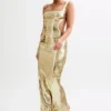Adoria maxi-jurk met pailletten en uitsnijdingen – Goud Adoria maxi-jurk met pailletten en uitsnijdingen – Goud