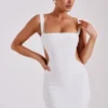 Adoria Maxi-jurk met pailletten en uitsnijdingen – Wit Adoria Maxi-jurk met pailletten en uitsnijdingen – Wit