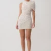 Adrienne mini-jurk met mesh en één schouder – stippen Adrienne mini-jurk met mesh en één schouder – stippen