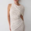 Adrienne mini-jurk met mesh en één schouder – stippen Adrienne mini-jurk met mesh en één schouder – stippen