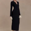 Amirose midi-jurk van gebreid materiaal met ruches – Zwart Amirose midi-jurk van gebreid materiaal met ruches – Zwart