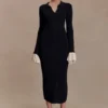 Amirose midi-jurk van gebreid materiaal met ruches – Zwart Amirose midi-jurk van gebreid materiaal met ruches – Zwart