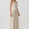 Annie strapless linnen top met strik aan de achterkant – Natuur Annie strapless linnen top met strik aan de achterkant – Natuur