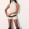 Birdie mouwloze top met hoge hals – ivoor Birdie mouwloze top met hoge hals – ivoor
