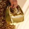 Bristol Mini Croissant leren tas – Goud Bristol Mini Croissant leren tas – Goud