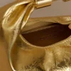 Bristol Mini Croissant leren tas – Goud Bristol Mini Croissant leren tas – Goud