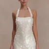 Caralee mini-halterjurk met pailletten – ivoor Caralee mini-halterjurk met pailletten – ivoor