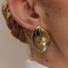 Felicity ovale oorbellen van gemengd metaal – goud Felicity ovale oorbellen van gemengd metaal – goud