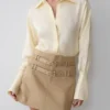 Marielle mini-rok met dubbele riem – taupe Marielle mini-rok met dubbele riem – taupe