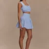Gretel mouwloze crop top – Blauw gestreept Gretel mouwloze crop top – Blauw gestreept