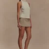 Birdie mouwloze top met hoge hals – ivoor Birdie mouwloze top met hoge hals – ivoor