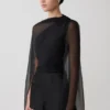 Ida doorschijnende asymmetrische cape met lange mouwen – Zwart Ida doorschijnende asymmetrische cape met lange mouwen – Zwart