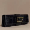 Jessica kunstleren krokodillenclutch – zwart Jessica kunstleren krokodillenclutch – zwart