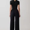 Junie bodysuit met korte mouwen en gekruiste hals – Zwart Junie bodysuit met korte mouwen en gekruiste hals – Zwart