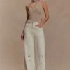 Leone metallic gebreide top met één schouder – goud Leone metallic gebreide top met één schouder – goud