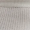 Mazie asymmetrische gebreide top met lange mouwen van kasjmiermix – ivoor Mazie asymmetrische gebreide top met lange mouwen van kasjmiermix – ivoor