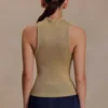 Nikki Lurex-top met metalen details – Goud