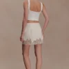 Nina mini-rok van kant en satijn – ivoor Nina mini-rok van kant en satijn – ivoor