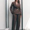 Penelope geplooide broek met hoge taille – Chocoladebruin Penelope geplooide broek met hoge taille – Chocoladebruin