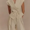 Raya linnen broek met middelhoge taille en wijde pijpen – naturel beige Raya linnen broek met middelhoge taille en wijde pijpen – naturel beige