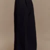Raya linnen broek met middelhoge taille en wijde pijpen – Zwart Raya linnen broek met middelhoge taille en wijde pijpen – Zwart
