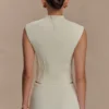 Romaine top met hoge hals van bandage-breisel – ivoor
