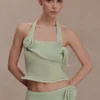 Samira gebreide haltertop met draai – pastelgroen Samira gebreide haltertop met draai – pastelgroen