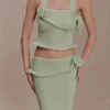 Samira gebreide haltertop met draai – pastelgroen Samira gebreide haltertop met draai – pastelgroen