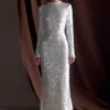 Sofia maxi-jurk met lange mouwen en pailletten – Wit Sofia maxi-jurk met lange mouwen en pailletten – Wit