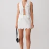 Tessa Broderie mouwloze top met strik aan de voorkant – Wit Tessa Broderie mouwloze top met strik aan de voorkant – Wit
